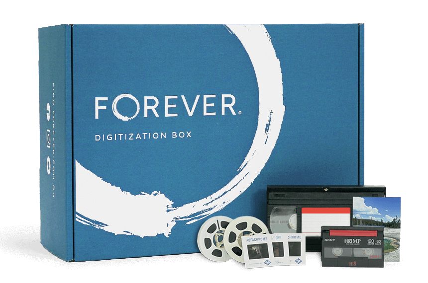 A Small FOREVER box with some media to be digitized and a tablet showing the end result.